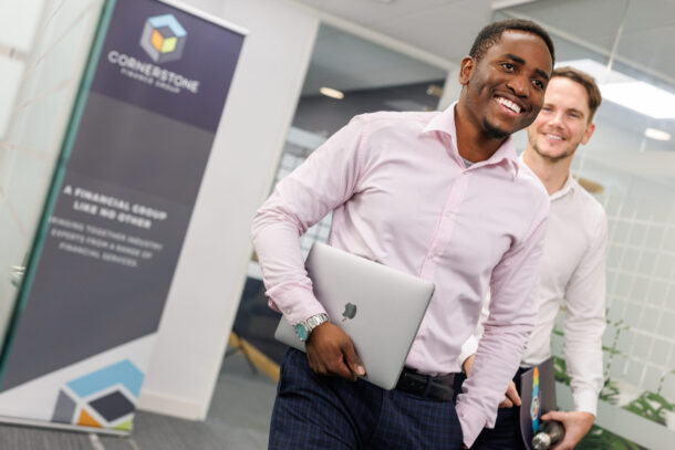 Leon Nyabvure and Chris Wilson, walking inside Cornerstone office